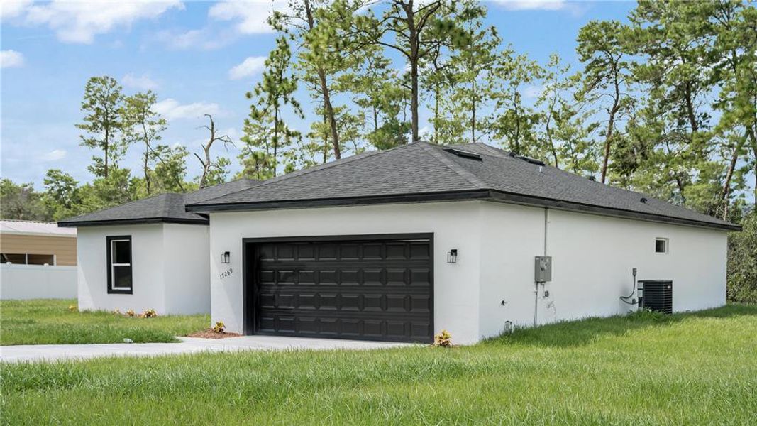 Front exterior of a new home in , Ocala, FL, highlighting curb appeal (Image 27).