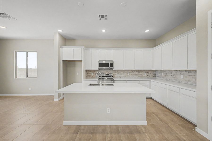 Furnished interior view inside a new home in Wildera, San Tan Valley (Image 4). Furnished interior view inside a new home in Wildera, San Tan Valley (Image 4).