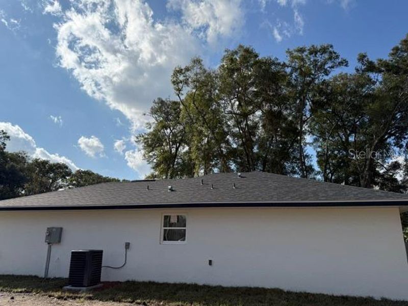 Exterior details and patio area of a home in , Summerfield (Image 23).