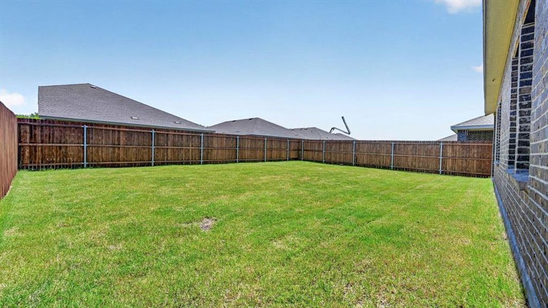 Exterior details and patio area of a home in Sanger Circle, Sanger (Image 3).