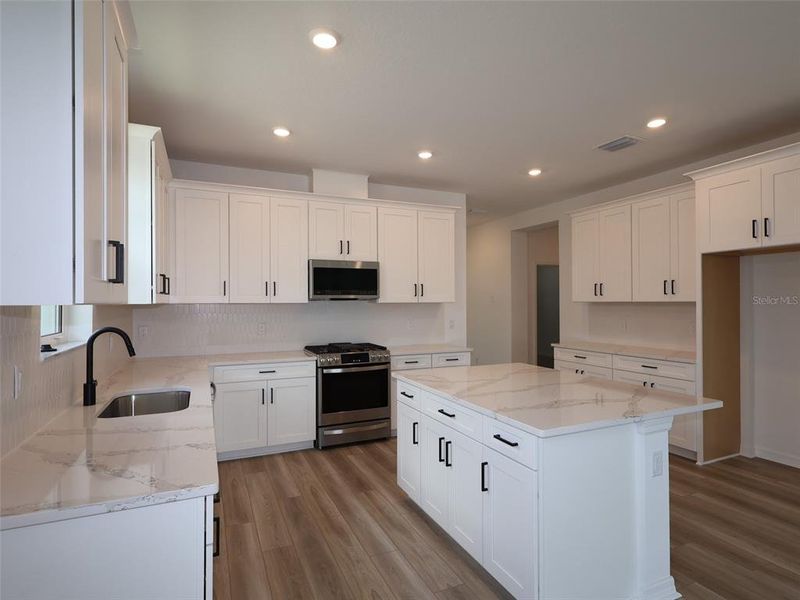 Furnished interior view inside a new home in Sweetwater at Lakewood Ranch, Lakewood Ranch (Image 7).