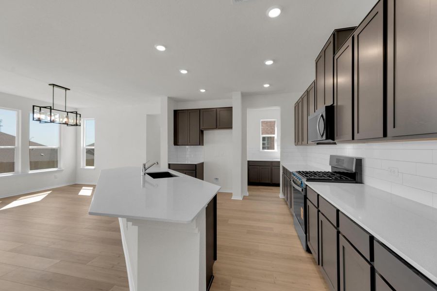 Furnished interior view inside a new home in Salerno - Classic Collection, Round Rock (Image 13). Furnished interior view inside a new home in Salerno - Classic Collection, Round Rock (Image 13).