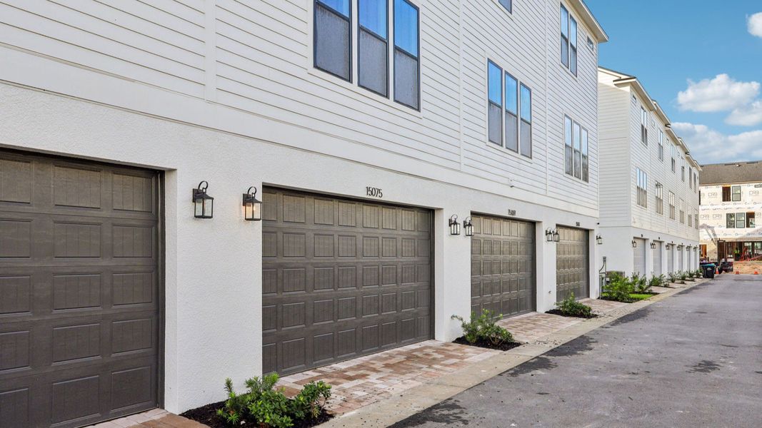 Exterior details and patio area of a home in Parkview at Hamlin, Winter Garden (Image 22).