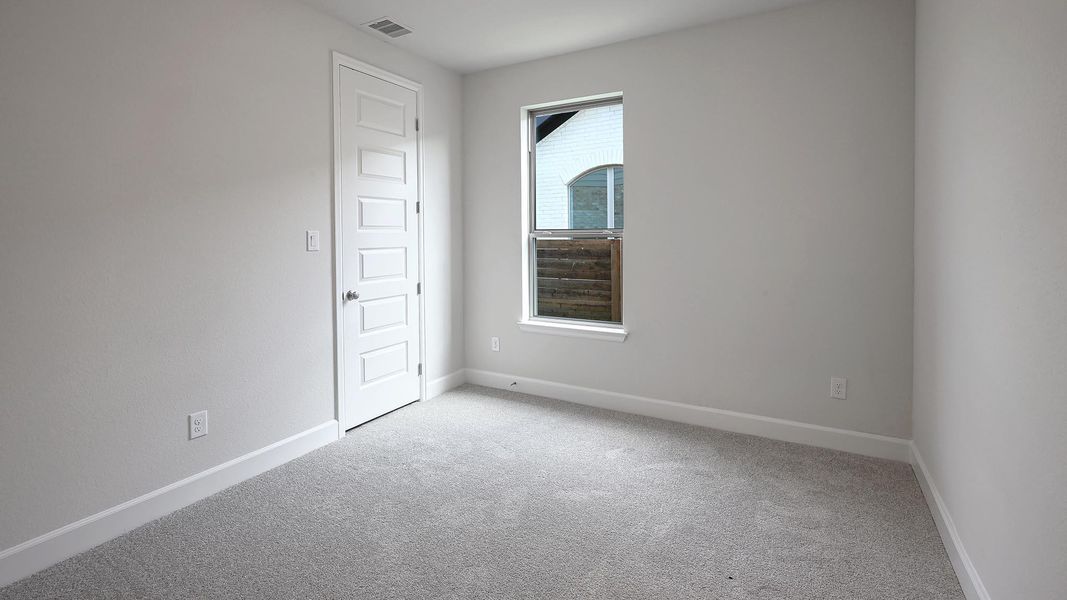 Spacious, unfurnished interior of a new home in Juniper Springs, Lockhart (Image 18).