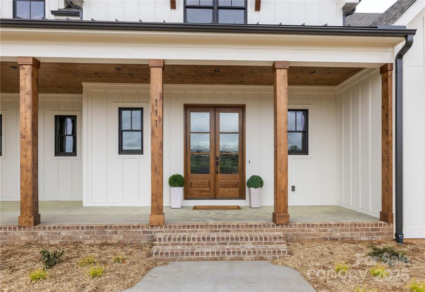 Front exterior of a new home in , Statesville, NC, highlighting curb appeal (Image 2).
