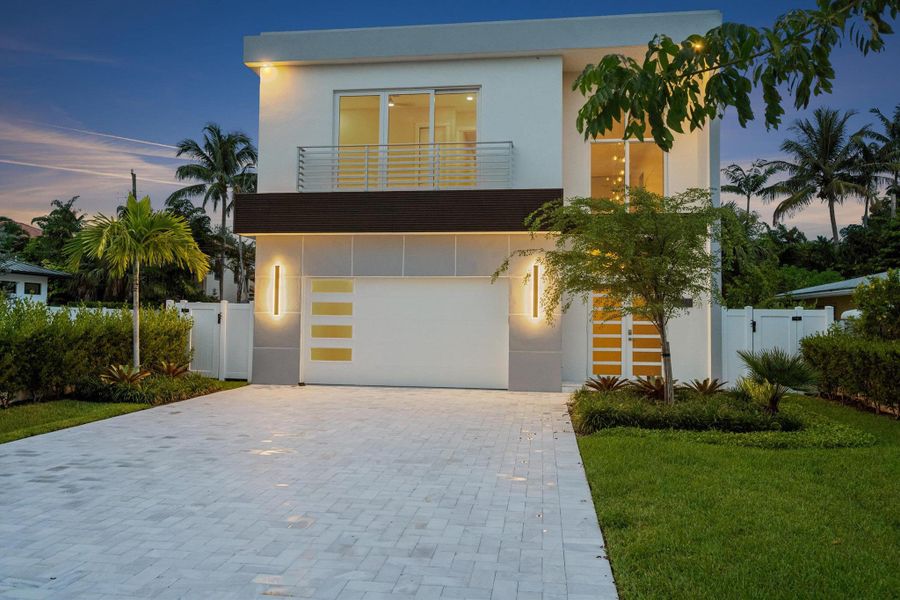 Front exterior of a new home in , Delray Beach, FL, highlighting curb appeal (Image 26). Front exterior of a new home in , Delray Beach, FL, highlighting curb appeal (Image 26).