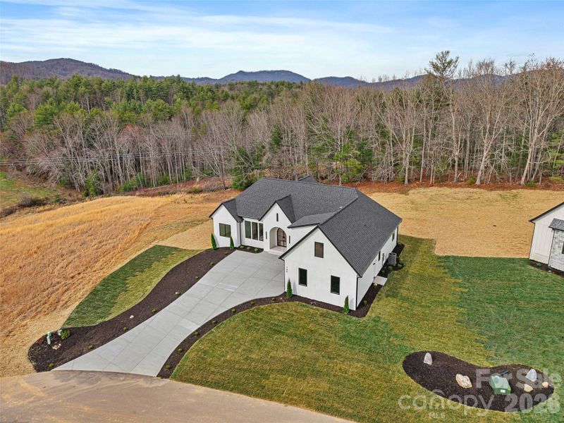 Front exterior of a new home in , Fletcher, NC, highlighting curb appeal (Image 24).