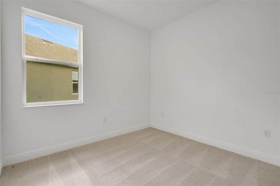 Spacious, unfurnished interior of a new home in Reserve at Hammock Oaks, Lady Lake (Image 25).