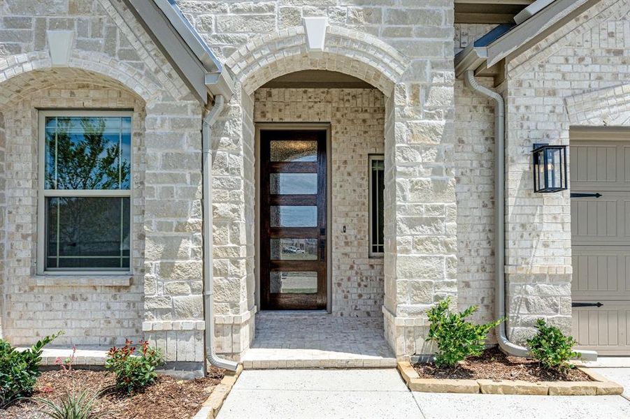 Exterior details and patio area of a home in Wildflower Ranch 60-65, Justin (Image 3). Exterior details and patio area of a home in Wildflower Ranch 60-65, Justin (Image 3).