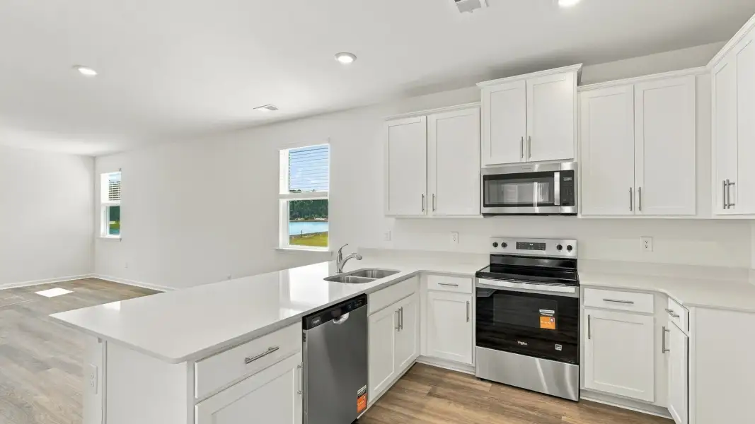 Furnished interior view inside a new home in The Lakes at North Glynn, Brunswick (Image 4).