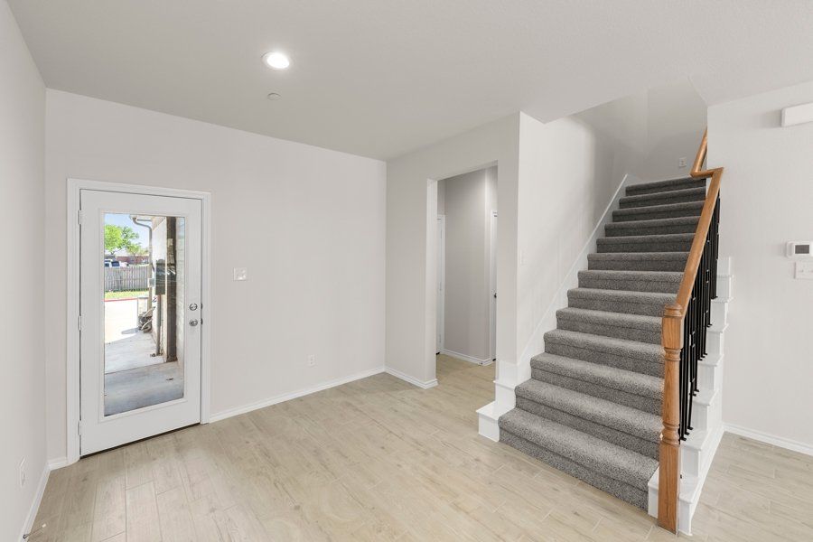 Front exterior of a new home in Sanger Circle, Sanger, TX, highlighting curb appeal (Image 18). Front exterior of a new home in Sanger Circle, Sanger, TX, highlighting curb appeal (Image 18).