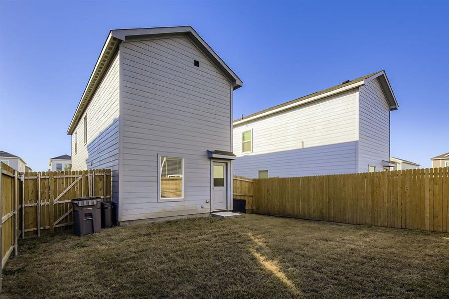 Exterior details and patio area of a home in Tillage Farms: Wellton Haven, Princeton (Image 20).
