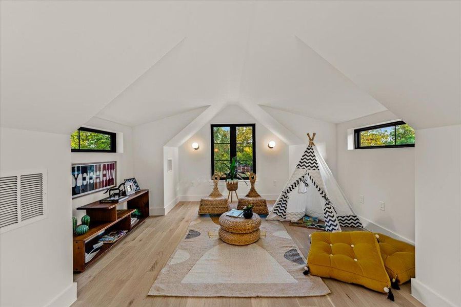 Playroom or office above the garage.