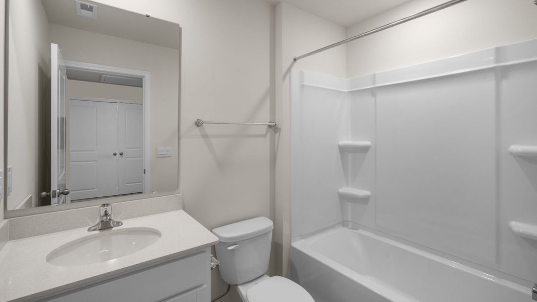 Representative furnished interior of a home built from the Pearson by D.R. Horton in The Townes at Ridgewood Farms, Winterville (Image 9).