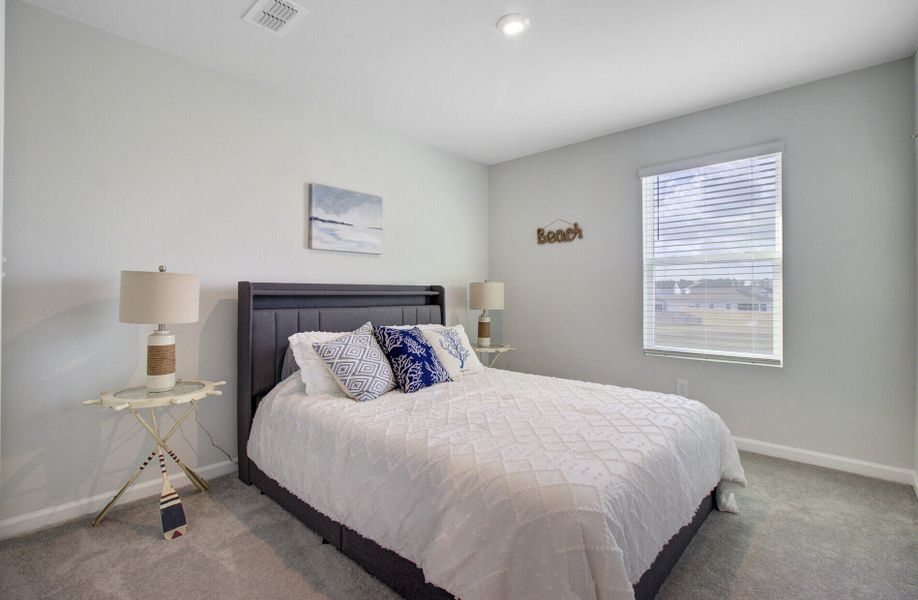 Furnished interior view inside a new home in Sanctuary Cove at Cane Bay, Summerville (Image 46).