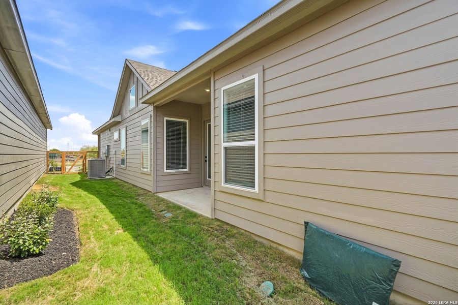 Exterior details and patio area of a home in The Crossvine, Schertz (Image 4).