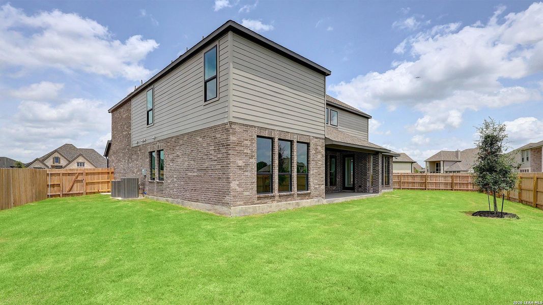 Exterior details and patio area of a home in Alsatian Oaks, Castroville (Image 22).