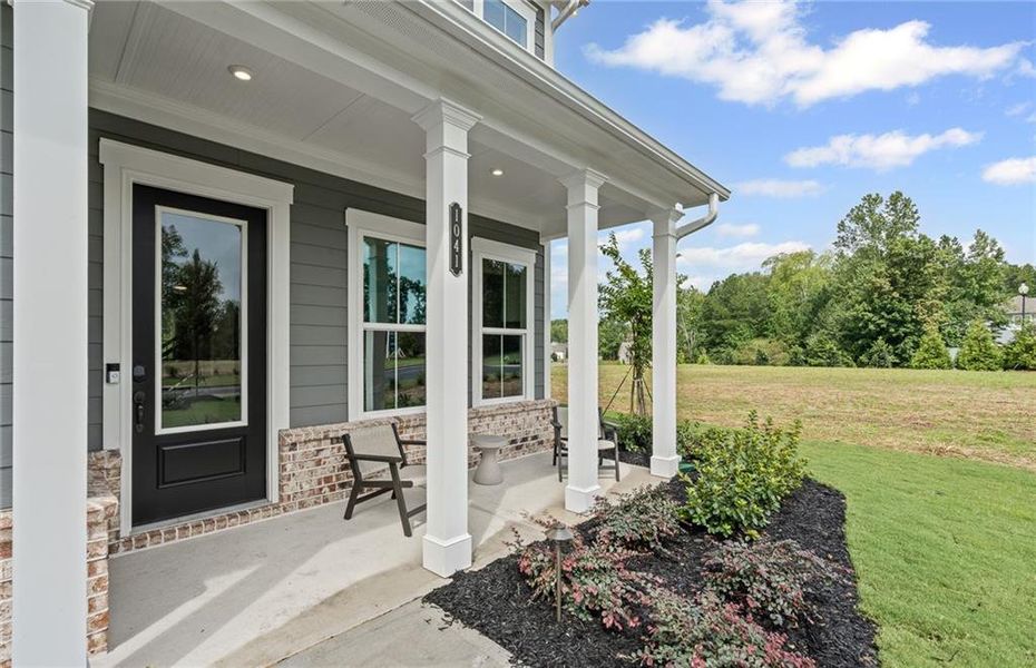Exterior details and patio area of a home in Traditions of Braselton, Jefferson (Image 23).