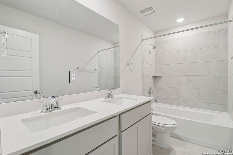 Furnished interior view inside a new home in Estancia Ranch - Premier Series, San Antonio (Image 16). Furnished interior view inside a new home in Estancia Ranch - Premier Series, San Antonio (Image 16).