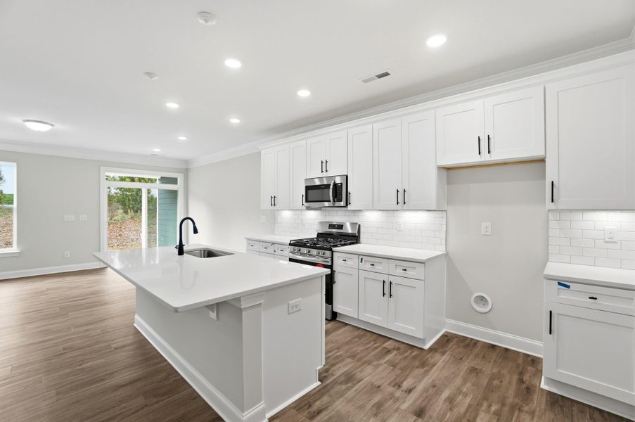 Furnished interior view inside a new home in Harrisburg Village Townhomes, Harrisburg (Image 9).