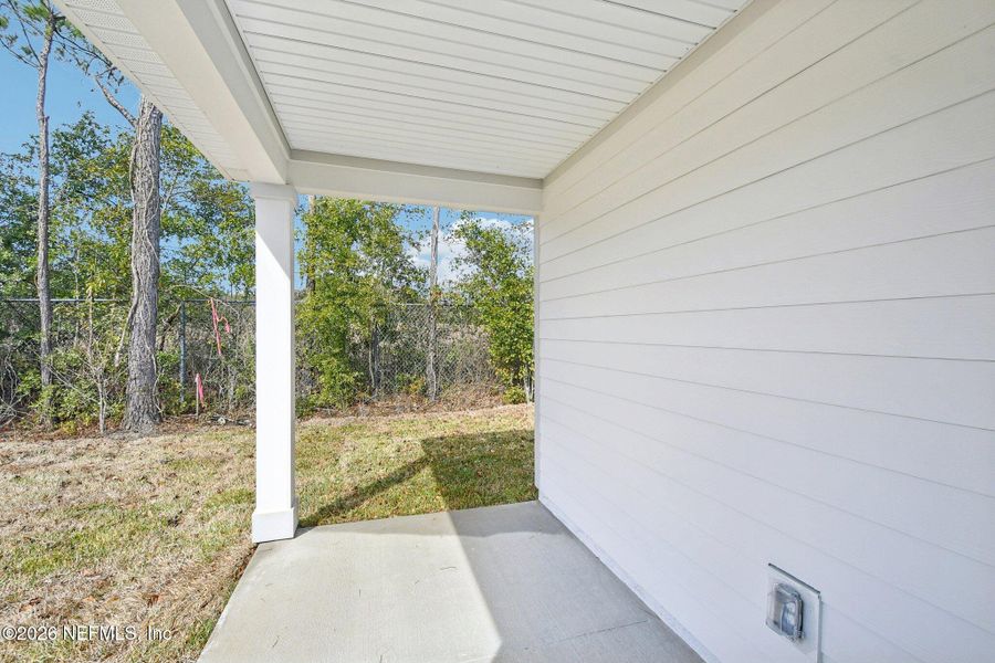 Exterior details and patio area of a home in Kings Landing, Jacksonville (Image 8).