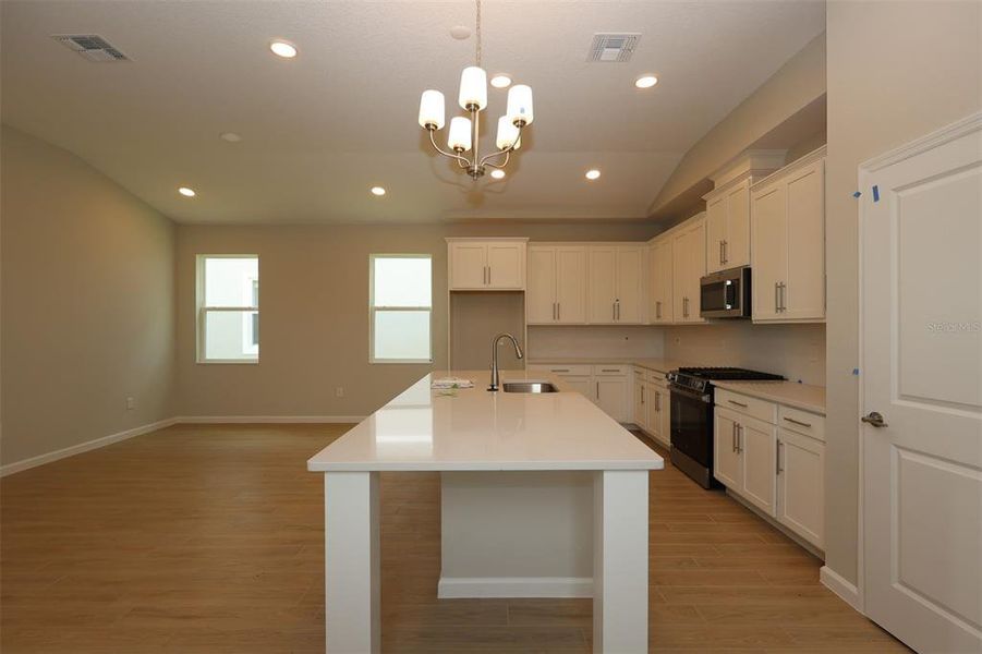 Furnished interior view inside a new home in Center Lake on the Park, St. Cloud (Image 25).