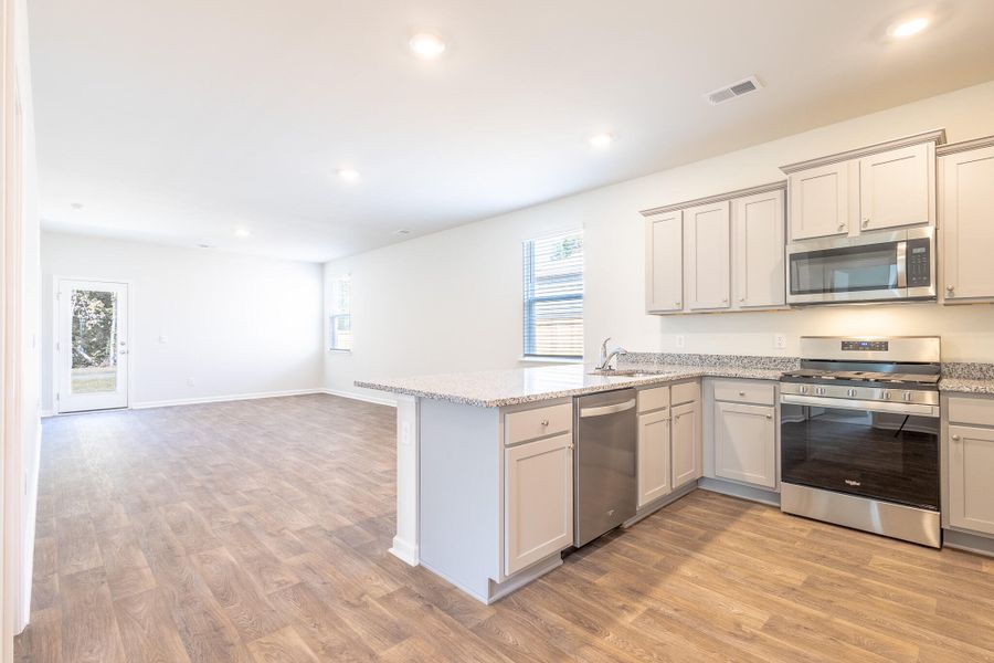 Spacious, unfurnished interior of a new home in Pine Hills at Cane Bay, Summerville (Image 14).