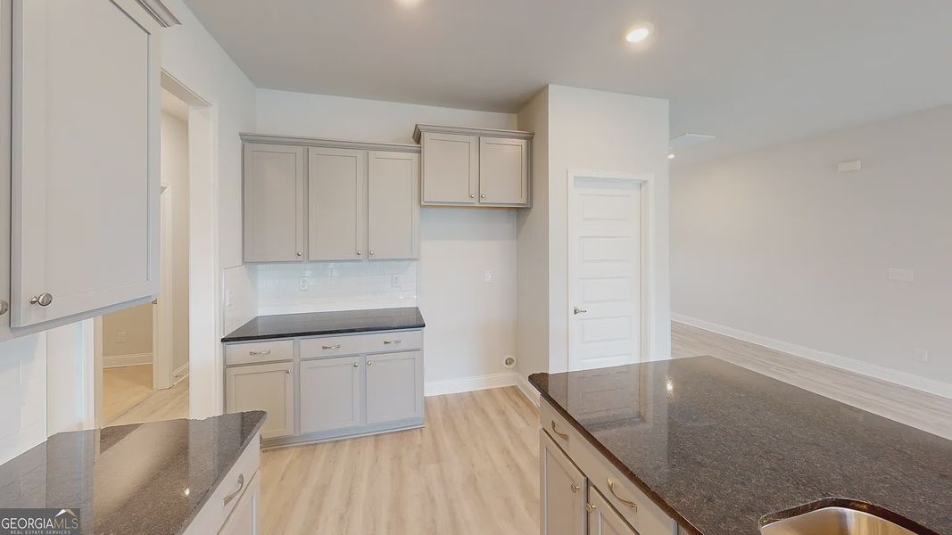 Furnished interior view inside a new home in Holliday Pass, Griffin (Image 5).