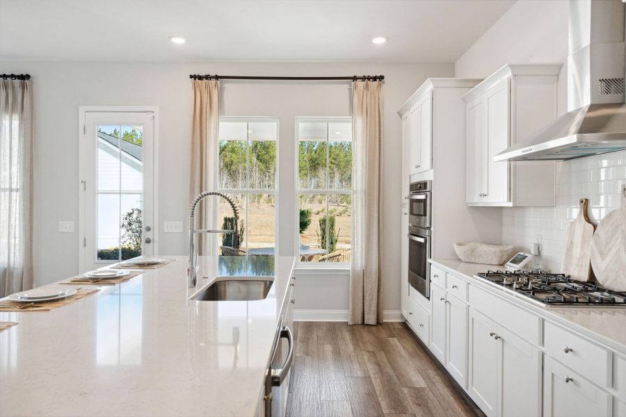 Furnished interior view inside a new home in Sweetgrass at Summers Corner: Row Collection, Summerville (Image 6).