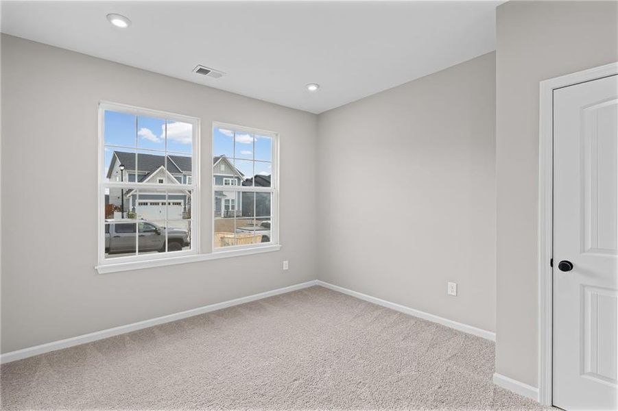 Spacious, unfurnished interior of a new home in The Reserve At Liberty Park, Braselton (Image 33).
