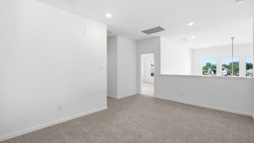 Furnished interior view inside a new home in Oaks at San Gabriel, Georgetown (Image 12).
