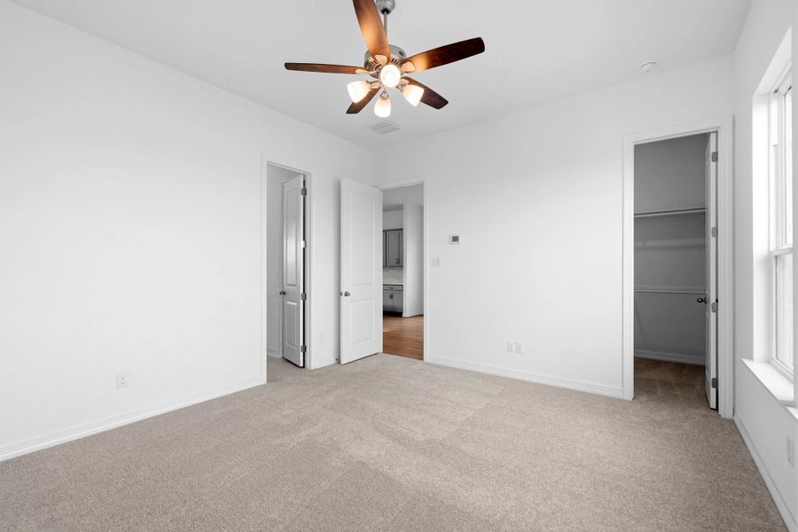 Spacious, unfurnished interior of a new home in Wildrye, Waller (Image 18).