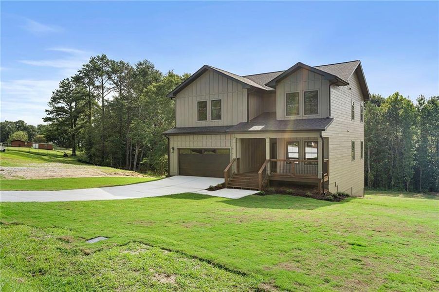 Front exterior of a new home in , Hiram, GA, highlighting curb appeal (Image 25).
