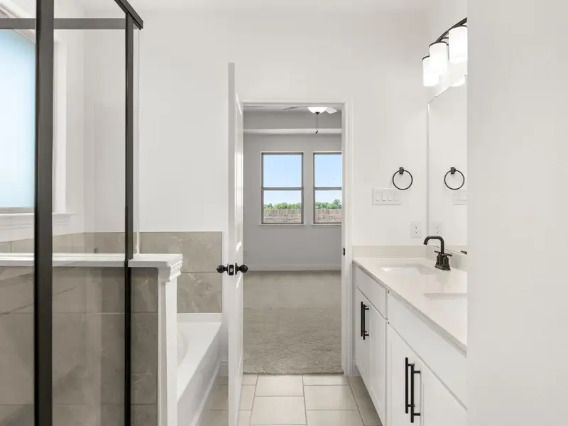Furnished interior view inside a new home in Mercer Meadows, Royse City (Image 11).