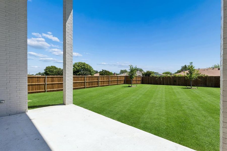 Exterior details and patio area of a home in Cambridge Manor, North Richland Hills (Image 3).