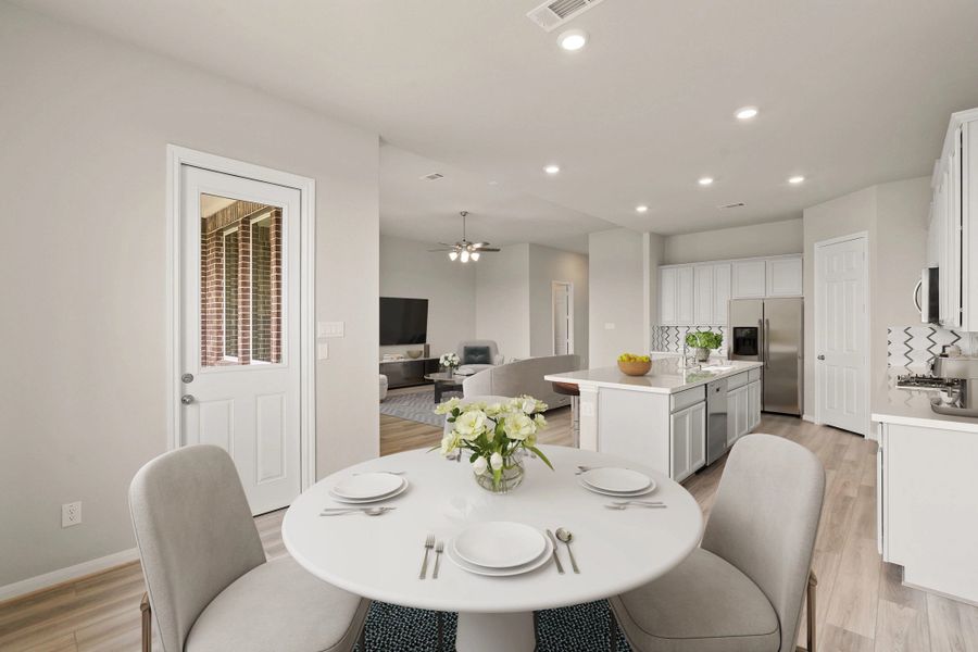 Dining area. Note: Sample product photo. Actual exterior and interior selections may vary by homesite. Photo may be virtually staged