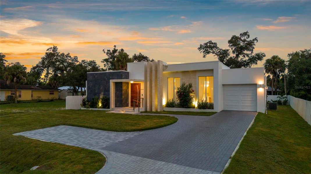 Front exterior of a new home in , North Port, FL, highlighting curb appeal (Image 25).