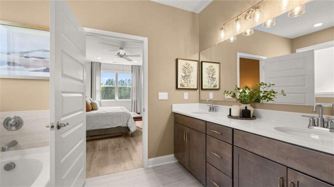Furnished interior view inside a new home in Oak Ridge Meadows - Active Adult, Locust Grove (Image 18).