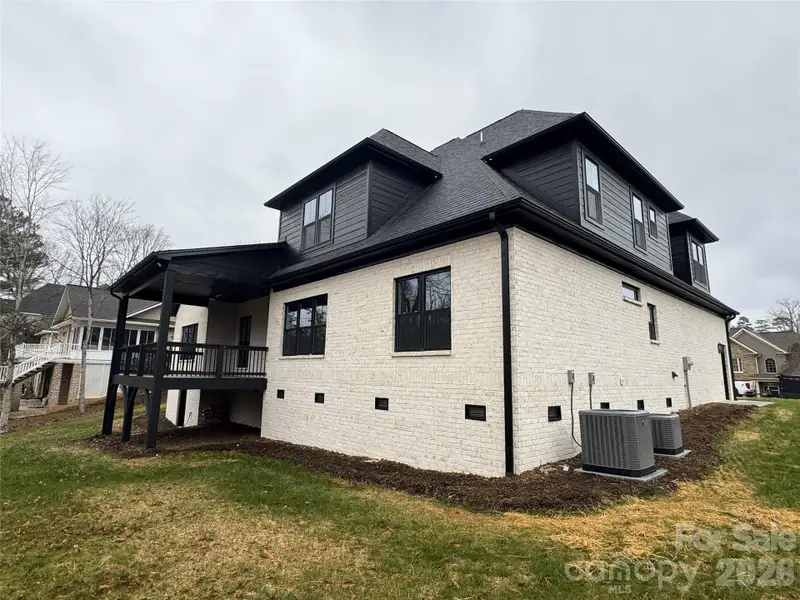 Exterior details and patio area of a home in , Hickory (Image 4).