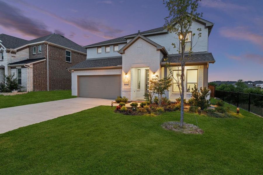 Front exterior of a new home in , McKinney, TX, highlighting curb appeal (Image 2). Front exterior of a new home in , McKinney, TX, highlighting curb appeal (Image 2).