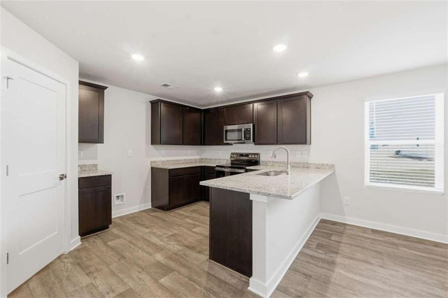 Furnished interior view inside a new home in The Enclave at Stonewall Station, Union City (Image 4).