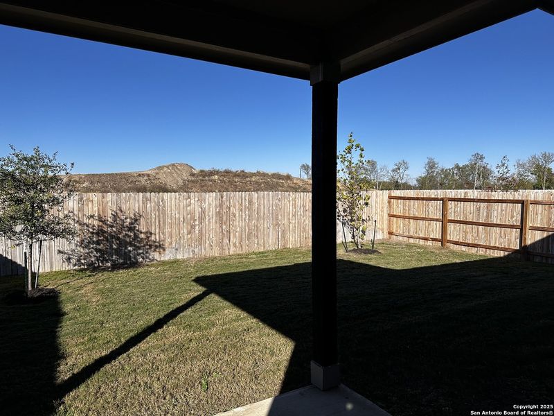 Exterior details and patio area of a home in Hennersby Hollow, San Antonio (Image 2).