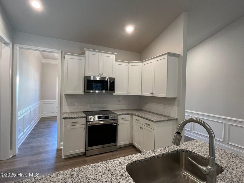 Furnished interior view inside a new home in Palmetto Creek, Bolivia (Image 7).