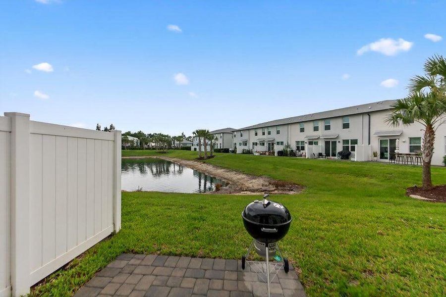 Exterior details and patio area of a home in Enclave at Mangonia Park, West Palm Beach (Image 4).