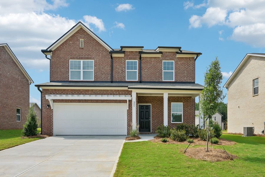 Representative exterior photo of a completed home built from the Radiance by Starlight Homes in Kendall Grove, McDonough, GA (Image 1). Representative exterior photo of a completed home built from the Radiance by Starlight Homes in Kendall Grove, McDonough, GA (Image 1).