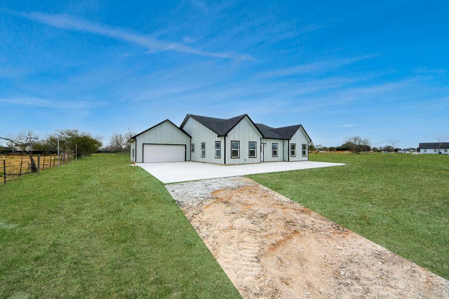 Front exterior of a new home in , Brookshire, TX, highlighting curb appeal (Image 26).