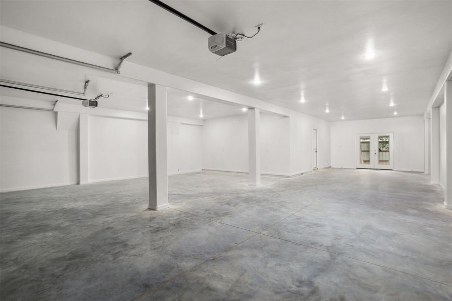 A second view of the garage with french doors to the backyard