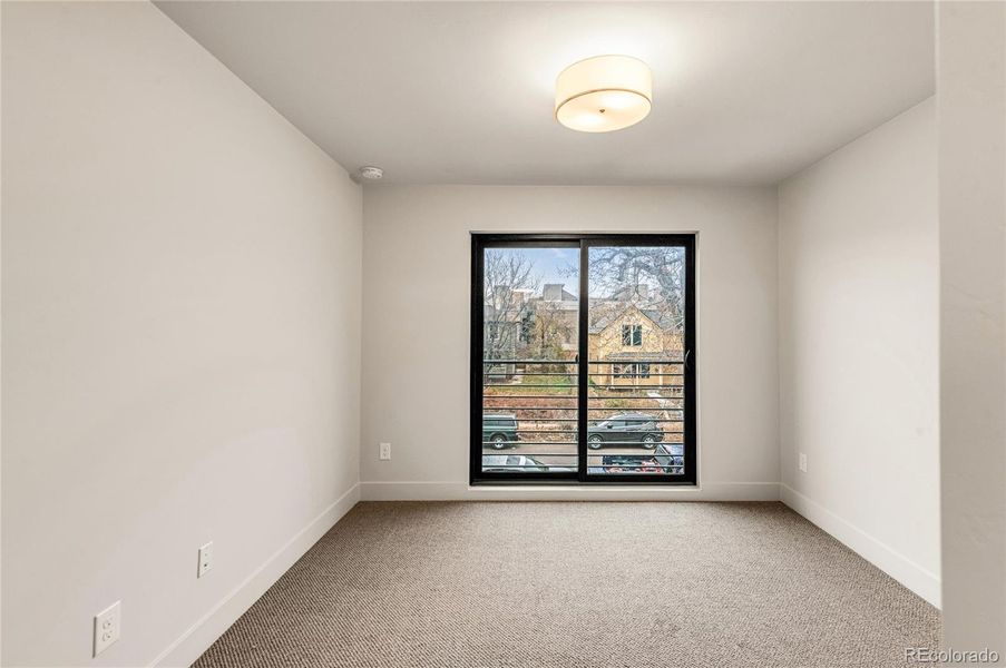 2nd floor east facing bedroom #2 with Juliette balcony