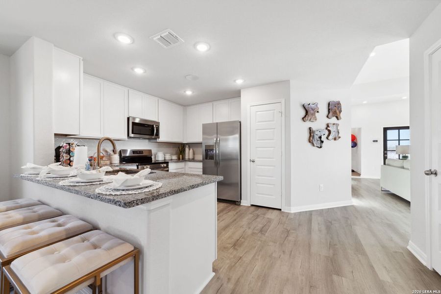 Furnished interior view inside a new home in Red Hawk Landing, San Antonio (Image 8).