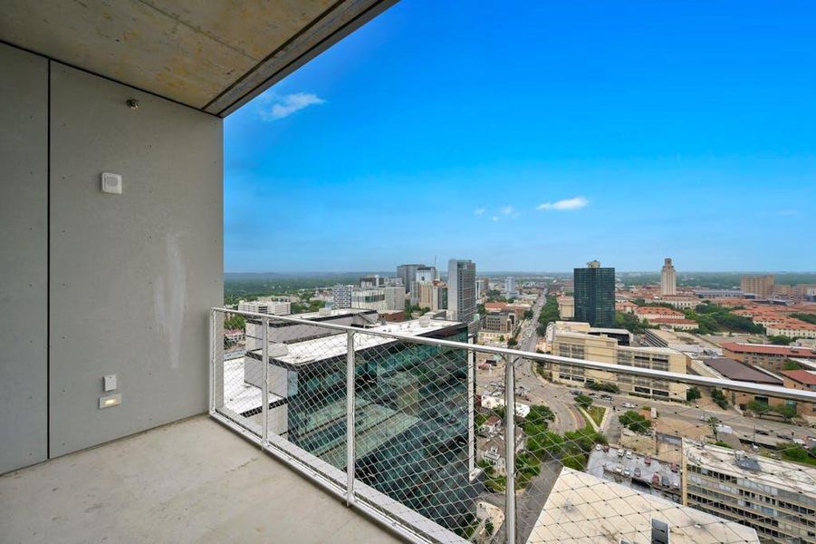 Just blocks from the Linden, the University of Texas Tower rises proudly over campus life—an enduring symbol of academic excellence and Austin's vibrant energy. Whether you're enjoying a walk through campus, catching a lecture, or taking in the seasonal blooms along Guadalupe Street, this historic landmark places the best of UT and downtown within easy reach... (Photo taken from 25th floor.) Just blocks from the Linden, the University of Texas Tower rises proudly over campus life—an enduring symbol of academic excellence and Austin's vibrant energy. Whether you're enjoying a walk through campus, catching a lecture, or taking in the seasonal blooms along Guadalupe Street, this historic landmark places the best of UT and downtown within easy reach... (Photo taken from 25th floor.)